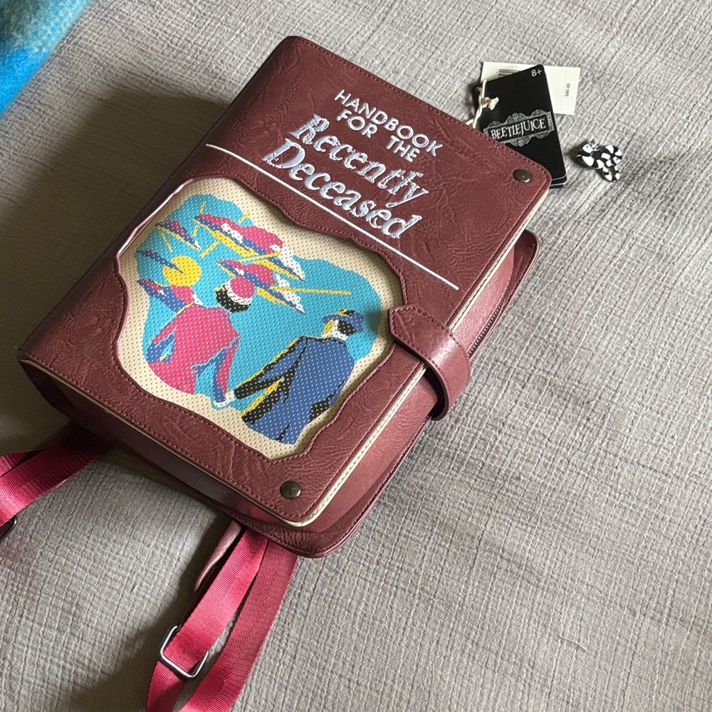 Loungefly 'Handbook for the Recently Deceased' Maroon Faux Leather Backpack